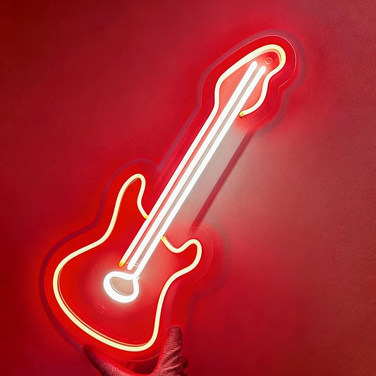 Neon guitar-shaped orange light on a background