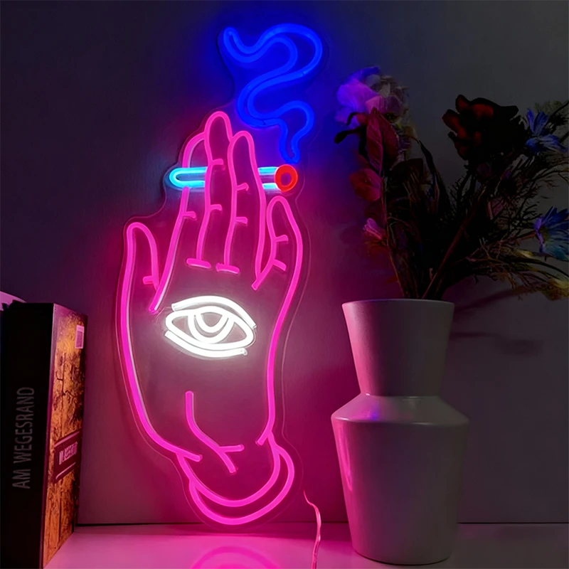 Neon sign of a hand holding a cigarette with an eye symbol, placed indoors.