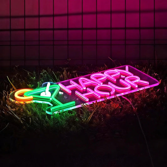 Neon sign with 'Happy Hour' on grass against a tiled wall