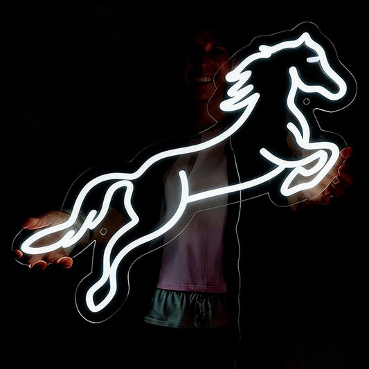 Neon white light shaped like a horse on a dark background