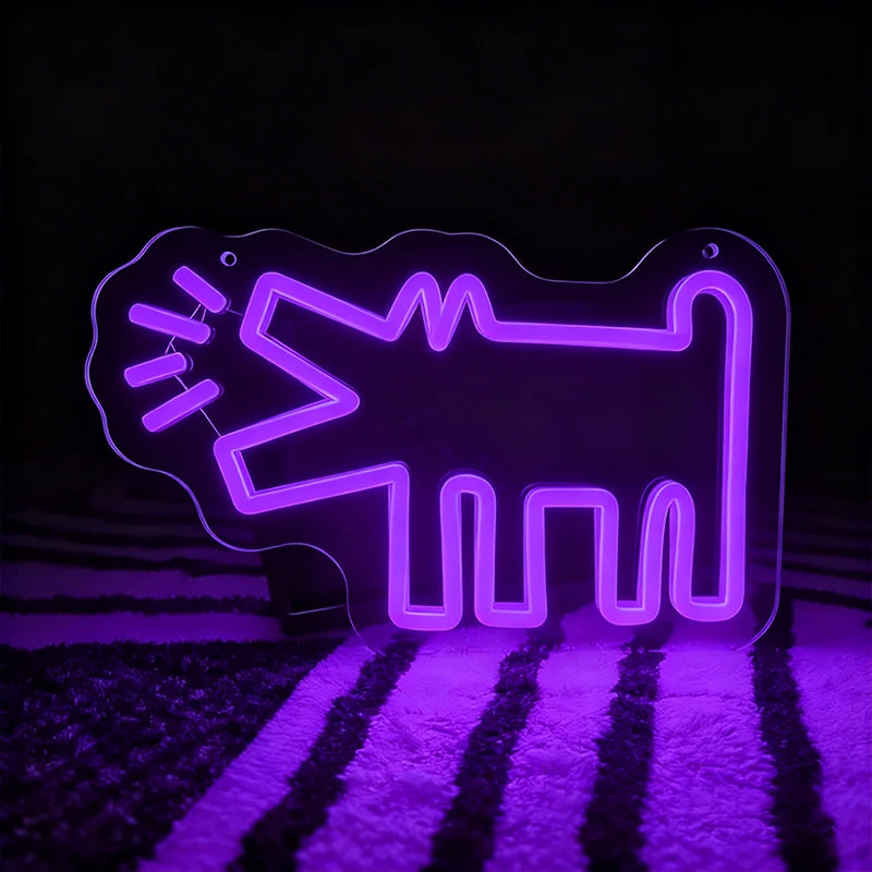 Purple neon sign shaped like a barking dog on a dark background