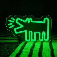 Green neon sign shaped like a barking dog on a dark background
