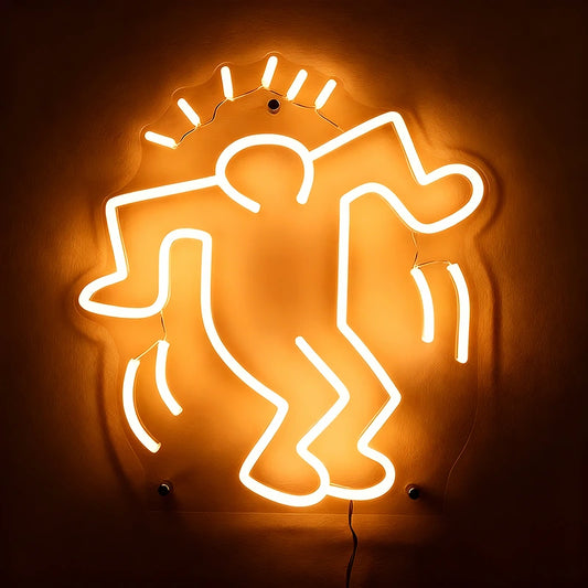 Neon sign of a stylized figure on a dark background