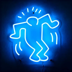 Blue neon sign of a stylized figure on a dark background
