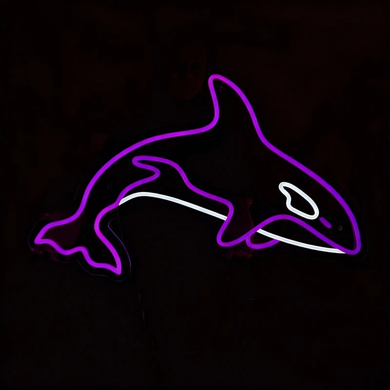 Neon sign with purple color of a shark on a black background