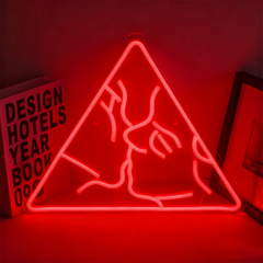 Neon red sign of a couple kissing in a triangle on a dark background
