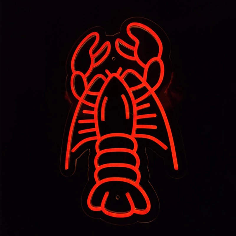 A red neon-style lobster outline sign glowing against a black background.