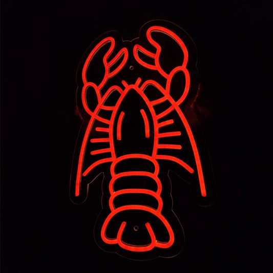 A red neon-style lobster outline sign glowing against a black background.