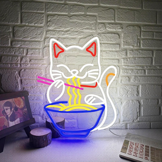 Neon light shaped like a lucky cat eating noodles against a brick wall.
