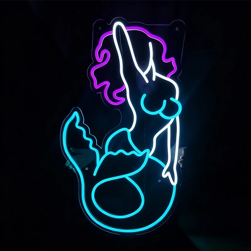 Neon sign of a mermaid silhouette on a black background