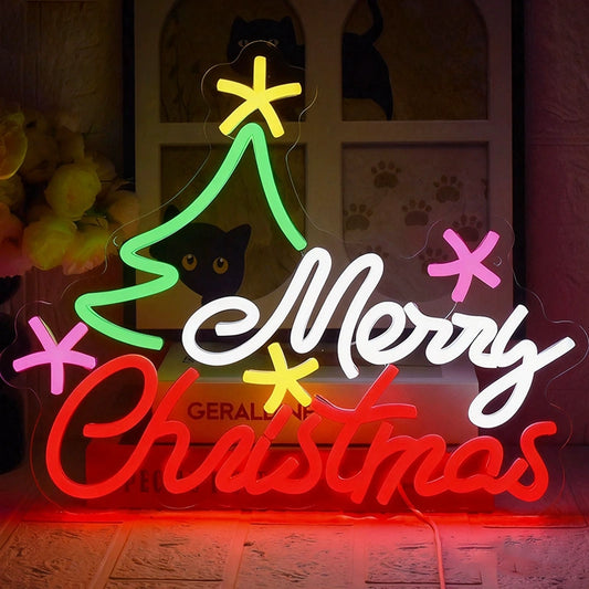 A decorative acrylic LED neon sign shaped like a Christmas tree with the words 'Merry Christmas' in white, red, and yellow neon tubing, displayed in a home setting.