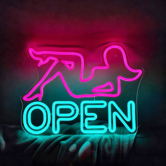 Neon sign with pink woman outline and ice blue 'OPEN' text on a dark background