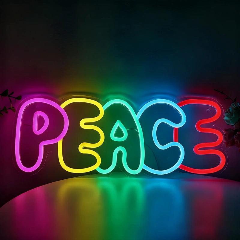 Neon sign with the word 'PEACE' in colorful letters on a dark background