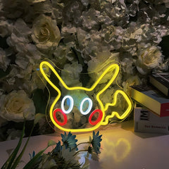 Neon sign shaped like a cartoon character pikachu surrounded by flowers