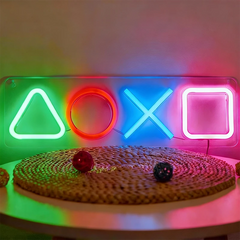 Playstation neon light sign on a textured surface.