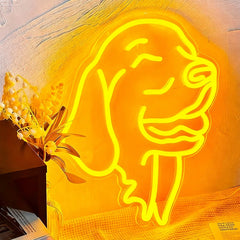 Neon sign of a lion on a textured wall with a vase of flowers.