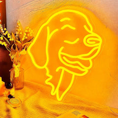 Neon sign of a dog's head on a textured wall with decorative elements.