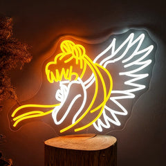 Neon sign of sailor moon creature on a wooden base against a dark background