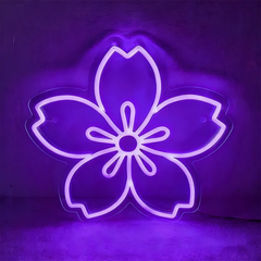 Neon purple sakura cherry blossom sign on a dark background