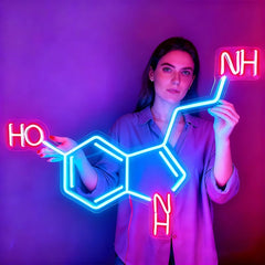 Person holding a neon light representation of a chemical molecule against a purple background