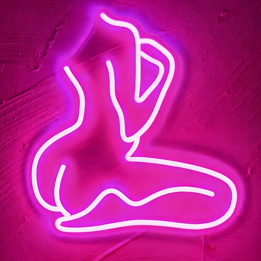 Hot pink neon sign of a sexy lady on a dark background