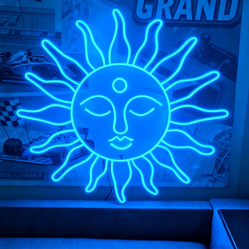 Neon blue sun-shaped sign with face design on a blurred background