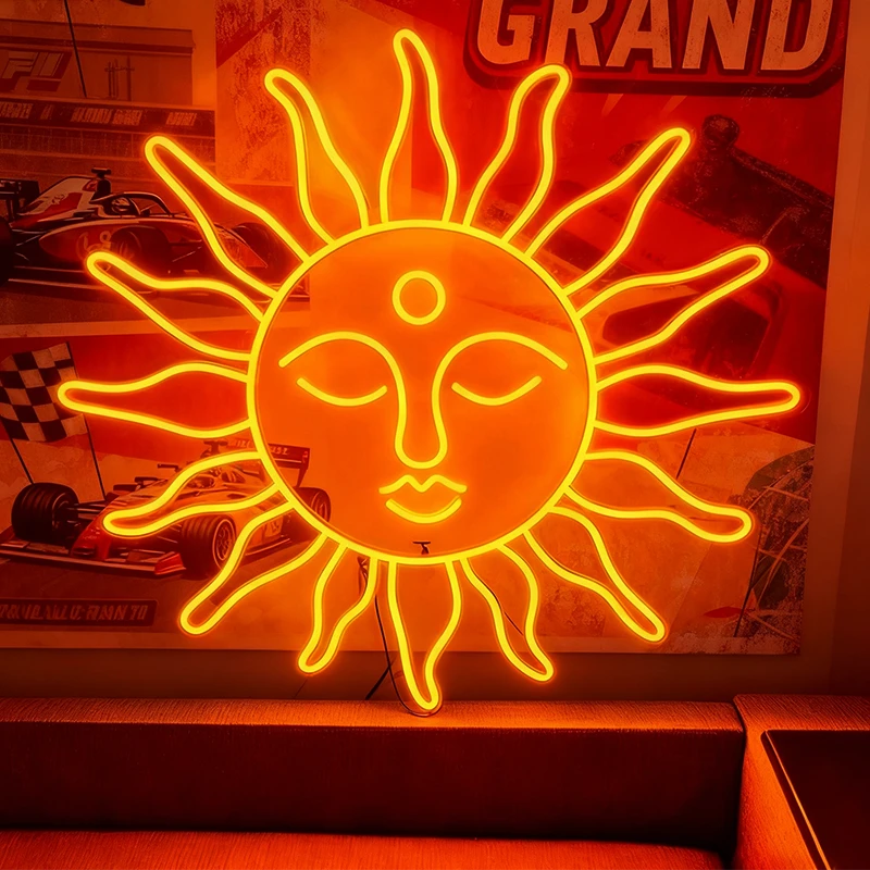 Neon sun-shaped light fixture with glowing yellow outline on an orange background