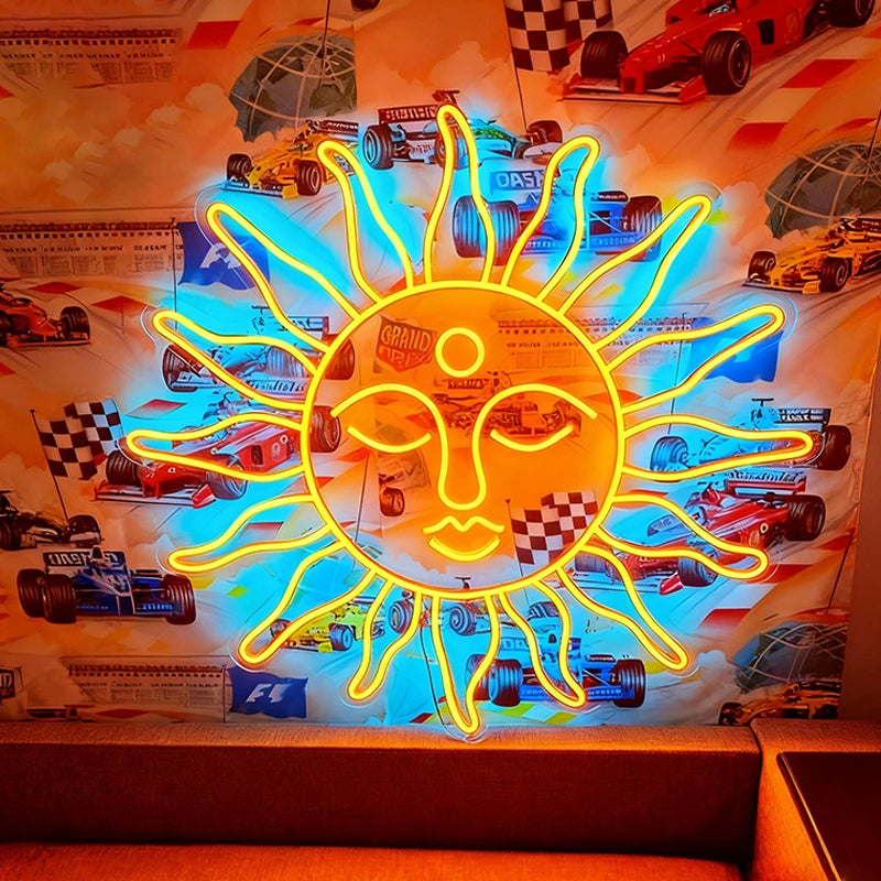 Neon sun-shaped sign with racing car graphics in the background